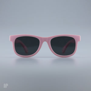 Little Legends Pink baby sunglasses, front view on grey