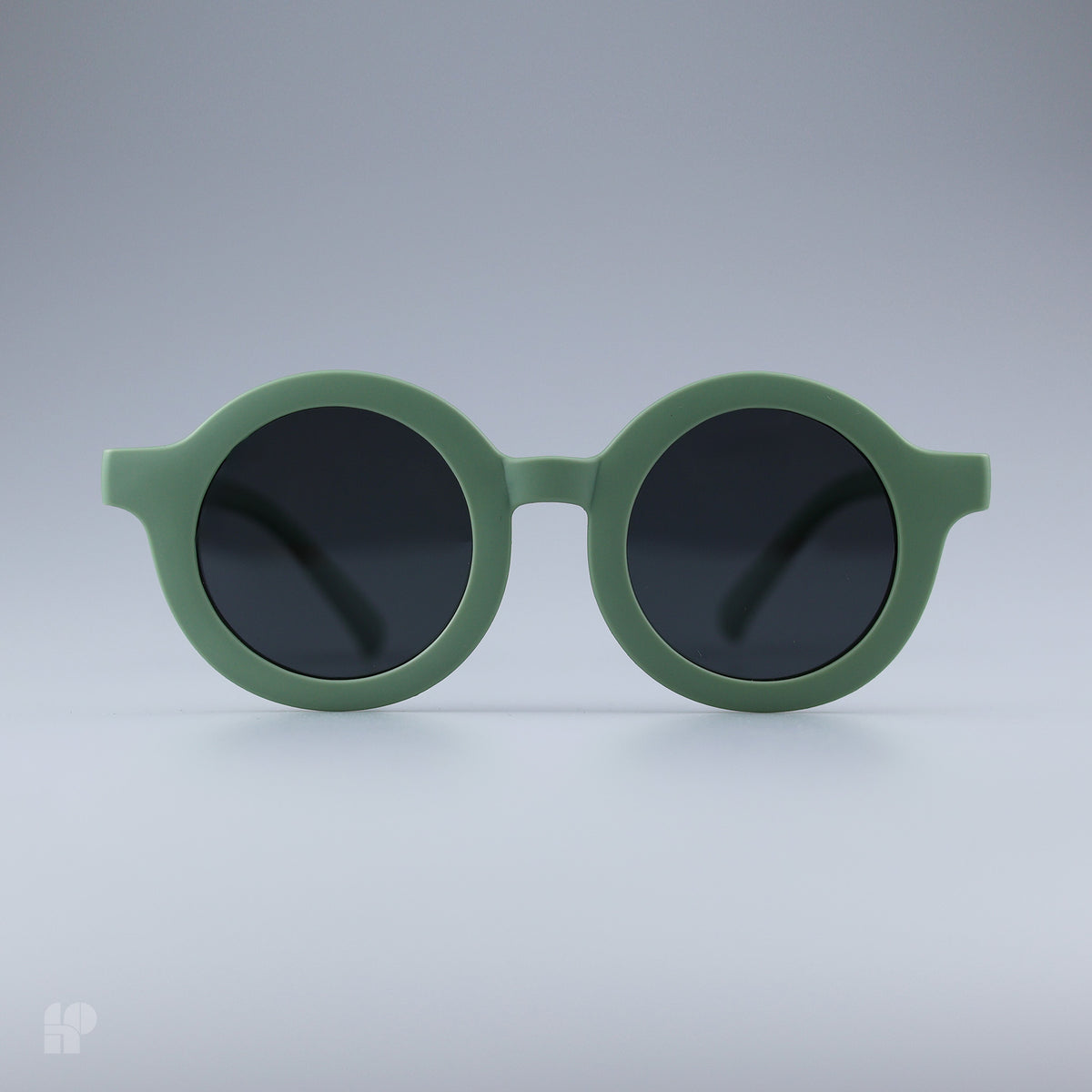 Roundabouts Sage Green kids sunglasses, front view on grey